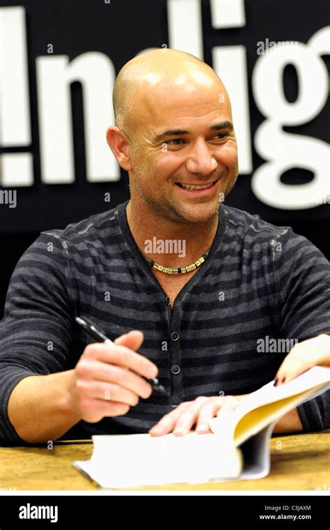 Andre Agassi Signs Copies Of His New Book Open At The Indigo