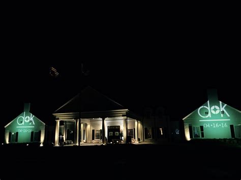 A color wash is quite different from wedding up lighting since it creates a general light and color fill, while up lighting highlights specific features in the space. his and her initials and wedding date gobo projection ...
