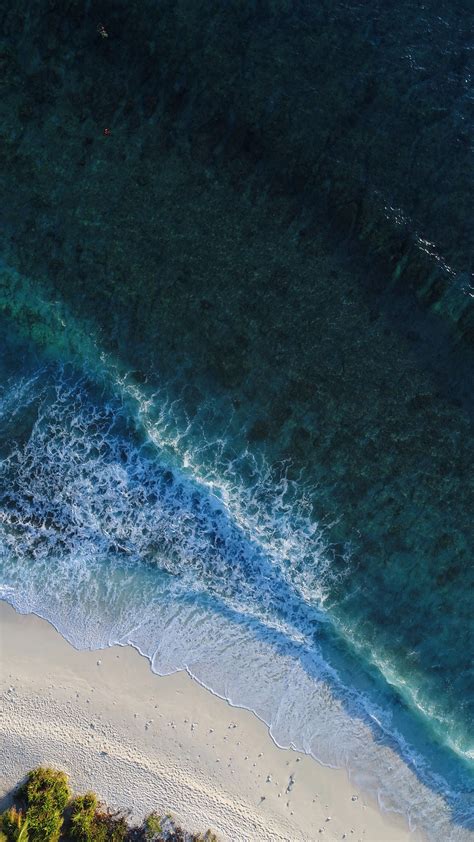 Download Wallpaper 2160x3840 Ocean Aerial View Surf Water Maldives