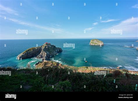 Beautiful View Of Gaztelugatxe Island In Spain With A Blue Sea In The