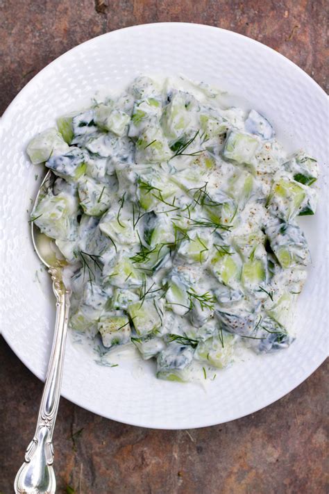 The cucumber salad dressing is made with yogurt so while you get the lovely creamy texture, it's also tangy and fresh, rather than rich and heavy. Cucumber Dill Yogurt Salad recipe | Kitchen Vignettes ...