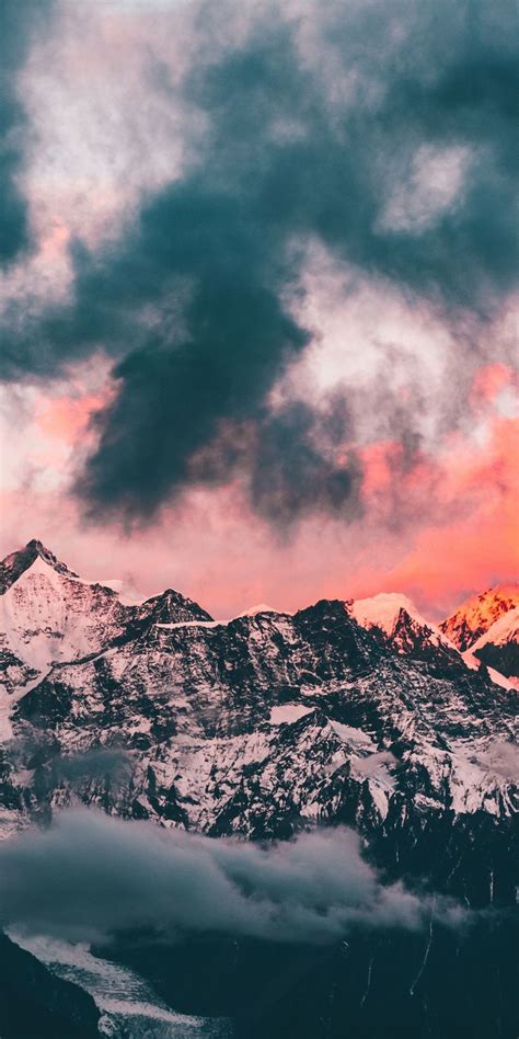 Clouds Sunset Glowing Peaks Mountains 1080x2160 Wallpaper