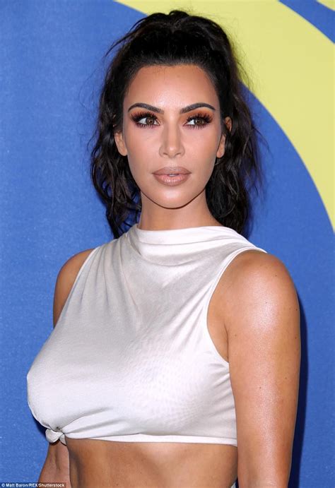 kim kardashian goes braless abs flashing cream crop high and skirts at cfda fashion award photos