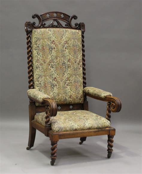 A Large Victorian Oak Throne Armchair With Carved Pierced And Barley