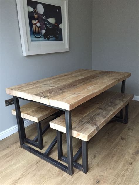 The sustainably sourced wood reveals markings that are i… Large Reclaimed Wood Dining Table and Benches - www ...