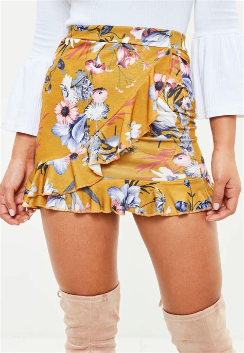 Lyst Missguided Mustard Yellow Floral Wrap Mini Skirt In Yellow