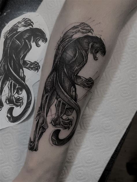 Tattoo Of A Cougar On The Arm