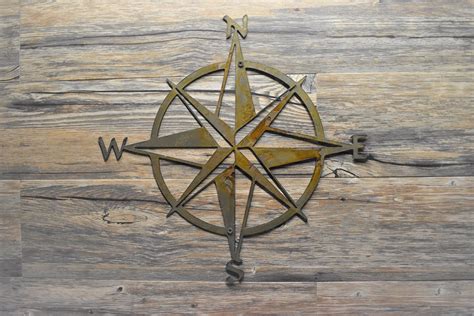 Nautical compass wall decor, especially those designed to coordinate with a home decor theme, is a favorite choice among homeowners everywhere. 16 | Nautical star, Steel wall, Compass wall art