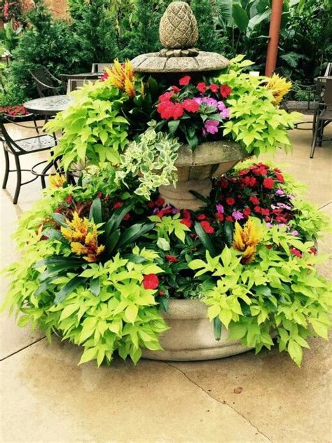 They are also cheap and easy to make. Fountain planter | Fountain, Plants, Outdoor