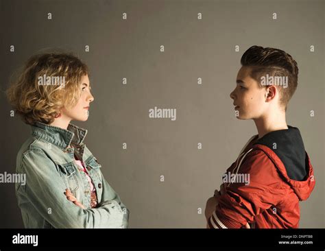 Staring At Each Other Arms Crossed Hi Res Stock Photography And Images