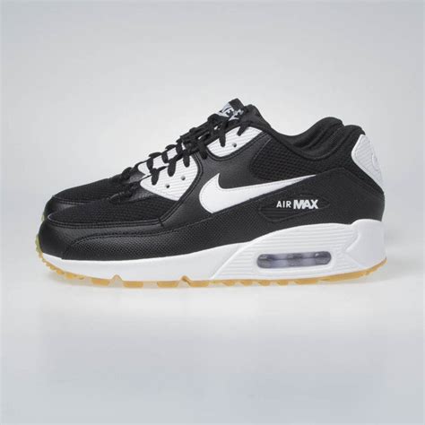 The pair shares design cues with its counterparts, most notably the exposed stitching and bold swoosh. Nike WMNS Air Max 90 black/white-gum light brown (325213 ...
