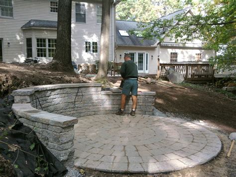 Otherwise, you'll find yourself with a barren, hot desert island of concrete. Do-It-Yourself Paver Patio Installation: A Good Idea? | Tomlinson Bomberger
