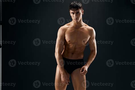 Handsome Man Nude Muscular Body In Dark Panties Posing Dark Background
