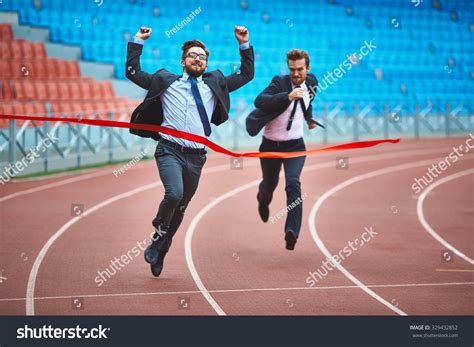 Successful Young Businessman Winning The Race Stock Photo 329432852