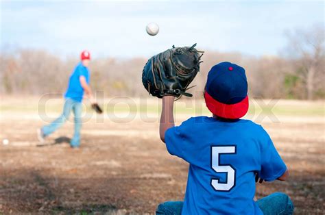 Two Boys Playing Baseball At The Park Stock Image Colourbox