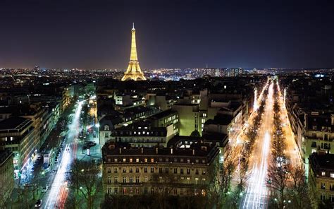 17 Gorgeous Photos Of The Eiffel Tower At Night Travel Leisure