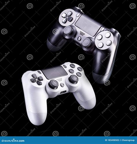 Set Of Video Game Joysticks Gamepad Isolated On A Black Background