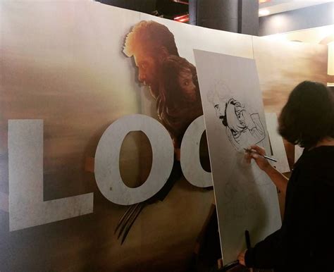 Íris Loureiro a recriar o cartaz de Logan na antestreia no cinemas