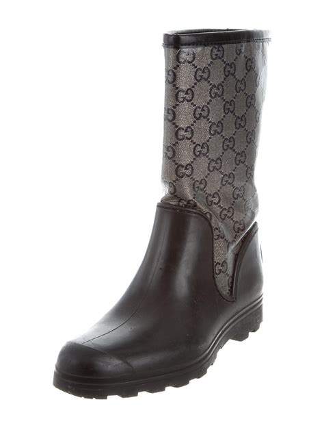 Enjoy free shipping and complimentary gift wrapping. Gucci GG Rain Boots - Shoes - GUC161063 | The RealReal