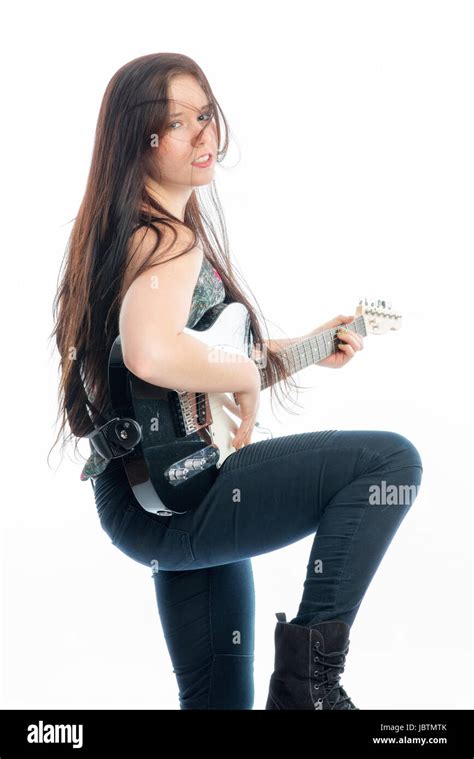 Young Woman Playing Electric Guitar Stock Photo Alamy
