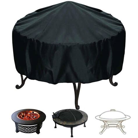 The can design keeps flames in. CABINA HOME Round Fire Pit Cover, Heavy Duty Waterproof ...