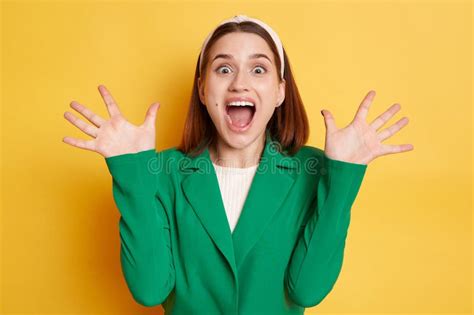 Extremely Happy Surprised Woman Wearing Green Jacket Posing Isolated