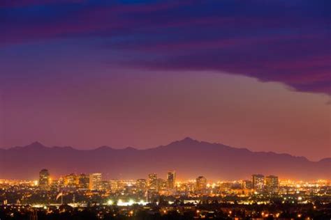Time lapse of the phoenix, arizona metro area and downtown from south mountain. Phoenix Arizona skyline under a dramatic sunset | Arizona, Living in arizona, Phoenix arizona