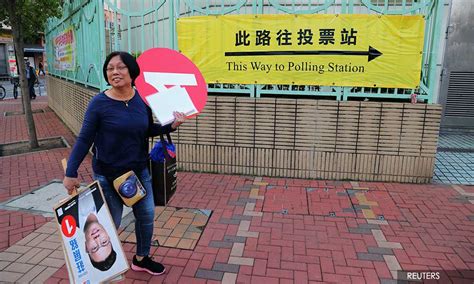 Elected representatives to local district councils. Hong Kong district council elections begin peacefully