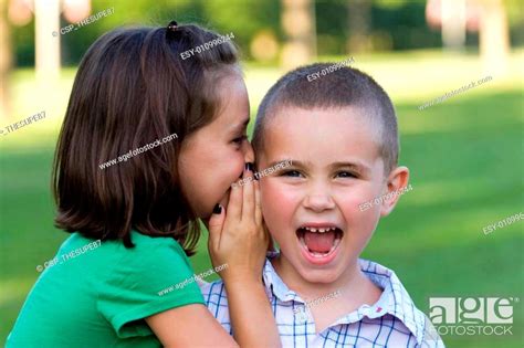 Kids Telling Secrets Stock Photo Picture And Low Budget Royalty Free
