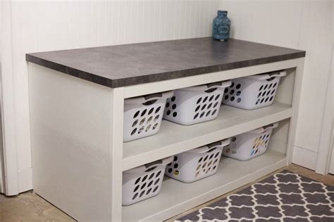 The ironing board cover is removable for easy cleaning. HugeDomains.com | Laundry room baskets, Laundry room ...