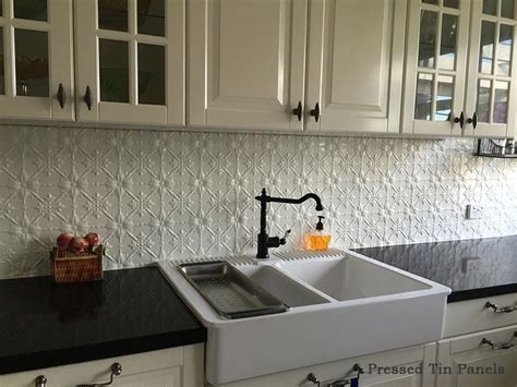 A tin tile backsplash is a great interior decorating technique that can transform a drab and boring wall space into something truly impressive. Modern Country Kitchen Splashback - Pressed Tin Panels ...