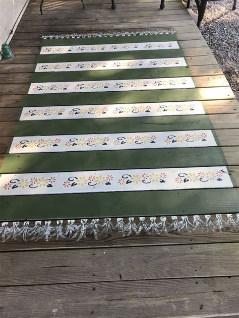 Have seen some inspiration online with folks painting awesome rugs on their porches, and wanted to try my hand at it. Painted rug with fringe on deck | Painted rug, Painting, Rugs