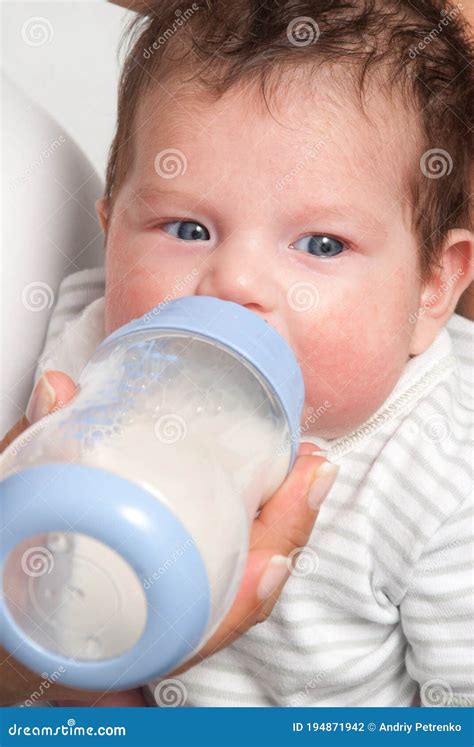 Baby Drinking Milk Of Her Bottle Stock Photo Image Of Food Life