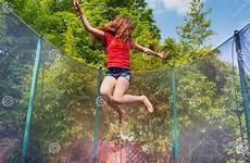 jumping trampoline girl outdoors active stock preview
