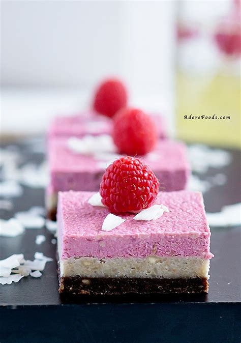 These vegan raspberry bars have a thick jammy layer of raspberries mixed with raspberry jam nestled between a buttery oat crumble crust and topping! Raw Vegan Raspberry Cheesecake Squares