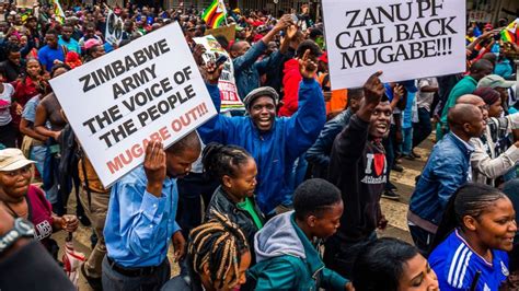 Thousands March In Zimbabwe Against President Robert Mugabe After Military Put Longtime Ruler