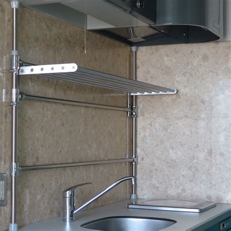 Floating lack wall shelf into pottery barn picture ledge. Ikea Hack: How to build floating shelves without fixing ...