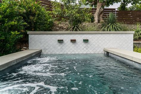 Pool Tile Up The Retaining Wall Pool Landscape Design Pool Water