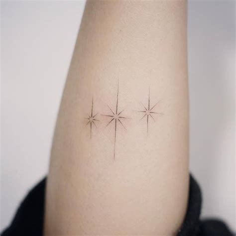 Fine Line Style Stars On The Forearm Tattoo Small Tattoos For Men
