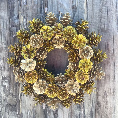 Gold Pinecone Wreath | Winter wood crafts, Pinecone wreath ...