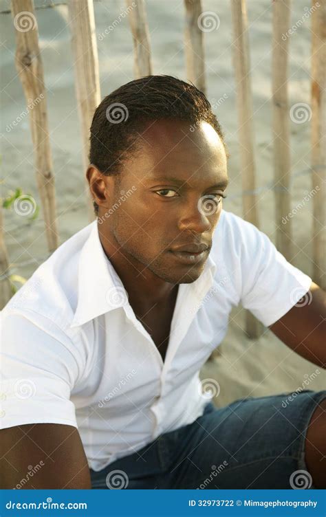 Handsome Black Man Sitting And Relaxing Alone Stock Photography Image