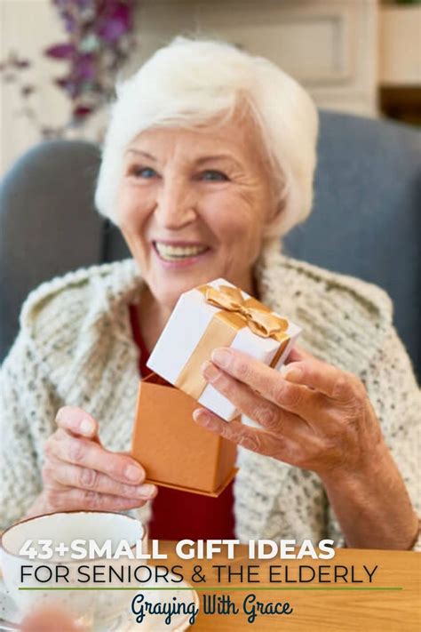 An Older Woman Holding A Gift Box With The Words Small Gift Ideas For