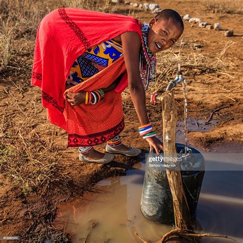African Woman From Maasai Tribe Collecting Water Kenya East Africa High