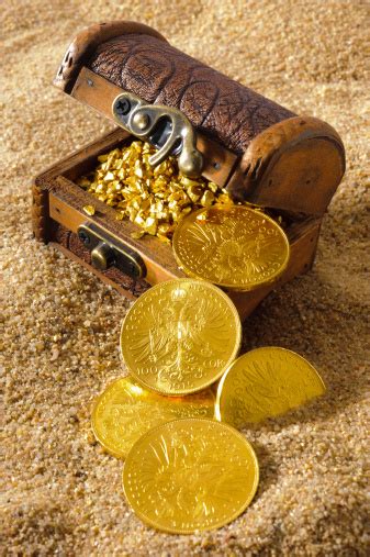 Treasure Chest From Pirates With Gold Coins And Nuggets Stock Photo