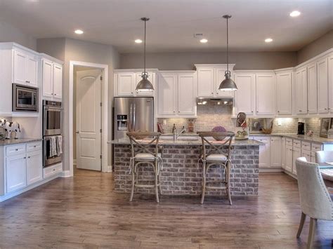 Gray kitchen cabinets brick kitchen. White cabinets. Brick island. This is what dreams are made of. | Brick kitchen island, Brick ...