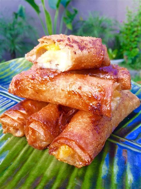 This turon recipe is a special version of the famous filipino street food. Turon (Banana and Mango Spring Roll) | Spring rolls, Filipino street food, Banana fritters