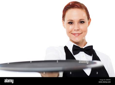 Cute Young Waitress Holding An Empty Tray On White Stock Photo Alamy