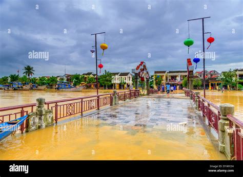 Flooding Waters Encroach On An Hoi Bridge Hoi An Vietnam Stock Photo