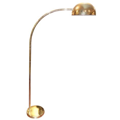 This curved design retro arc floor lamp with interior gold dome shade and black color. Vintage Brass Arc Floor Lamp at 1stdibs