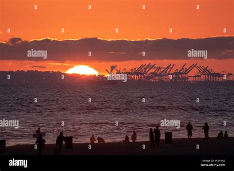 Sunset Over The Ocean In Huntington Beach California Stock Photo Alamy